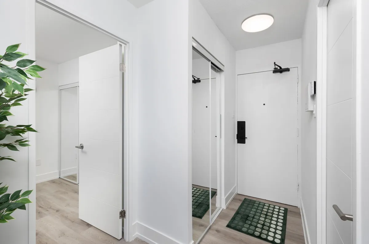 Suite entry corridor with bedroom doors