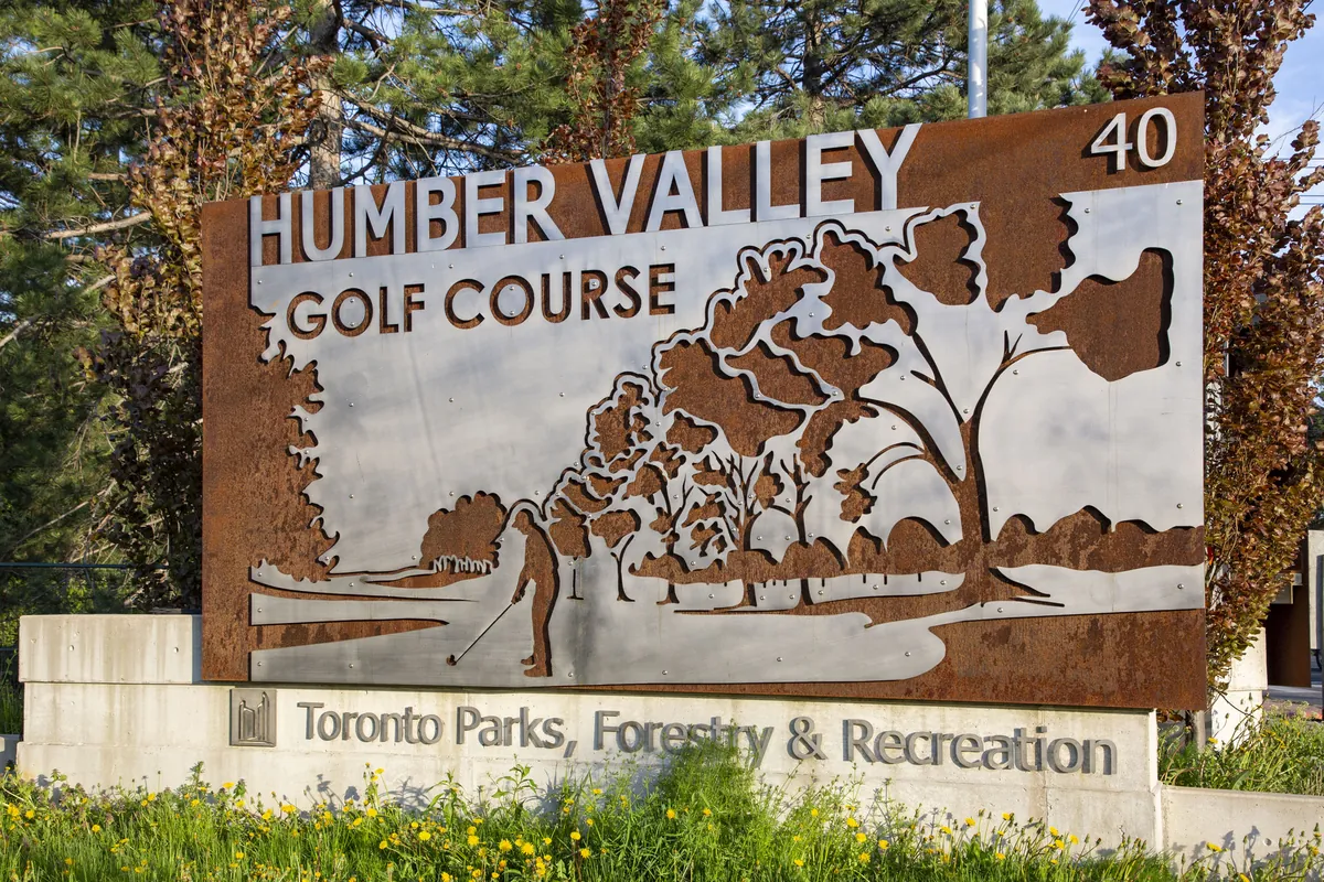 Trailhead sign at the edge of the Humber Valley parkland